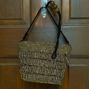 Pre-loved Glitzy zip top handbag, some seed beads fell off. By Zara